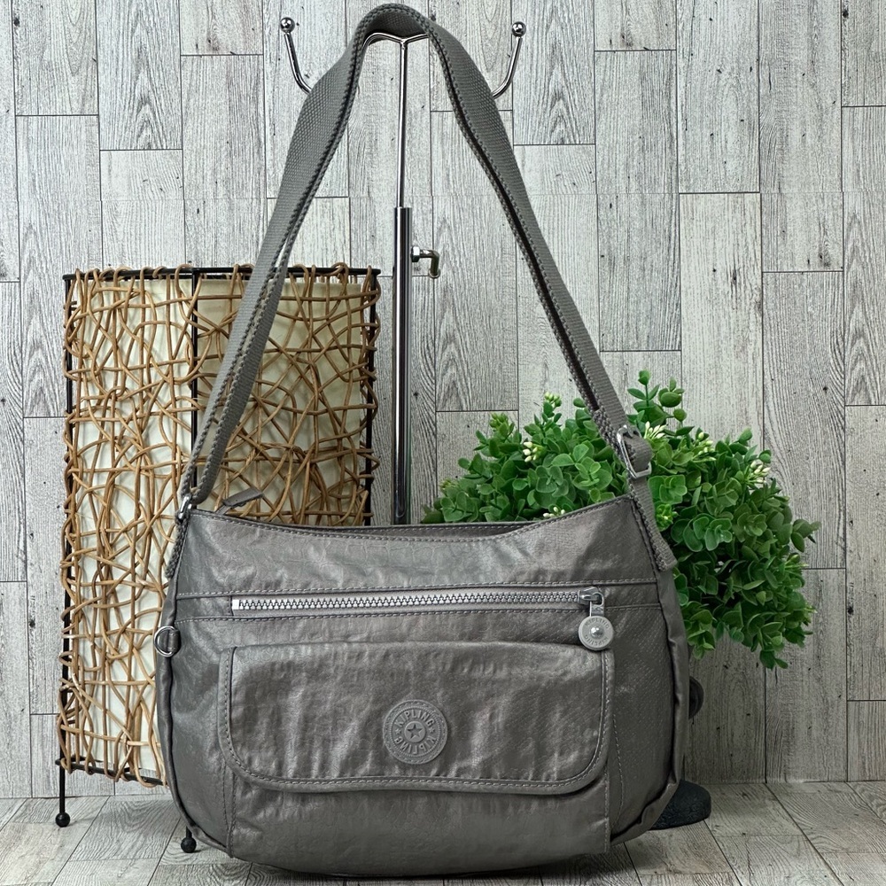 KIPLING - Syro Nylon Silver/Grey Sport  Multi Pocket Machine washable bag.